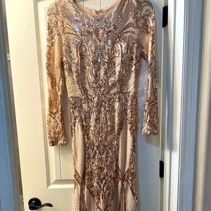 Selling a rosegold long sleeve, long dress from Macys